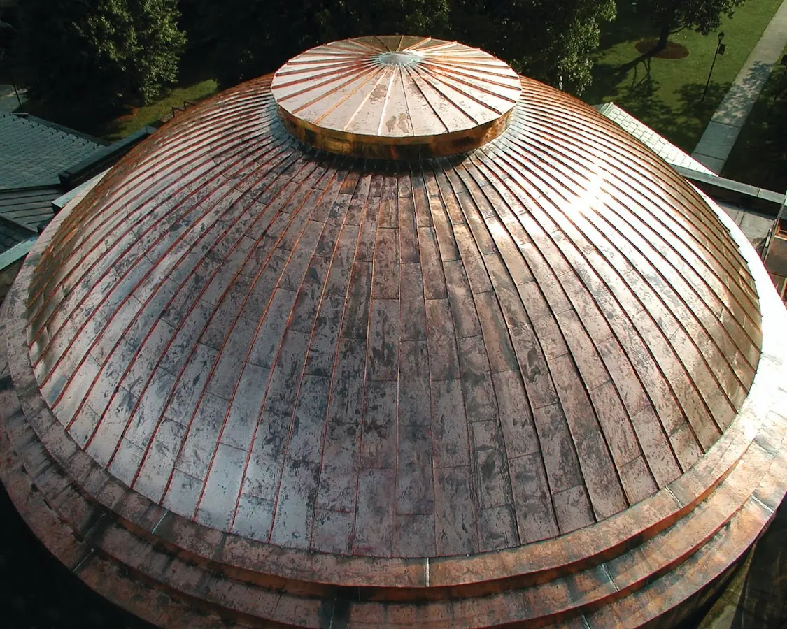 Craftsman Roofing crew installing a new roof in Inwood